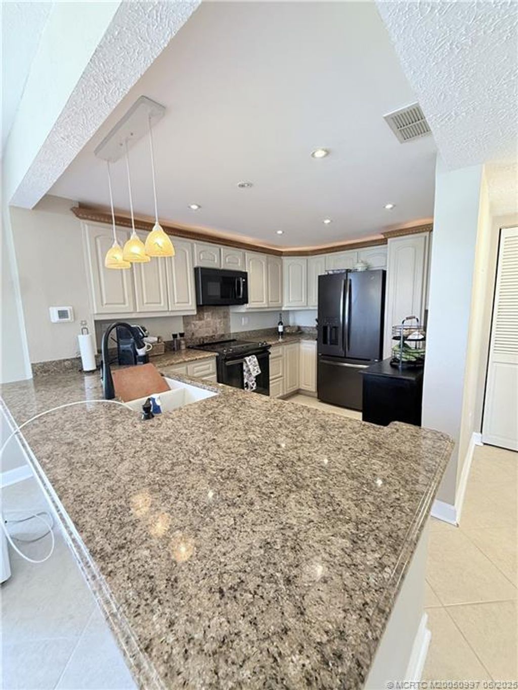 Photo of 10600 S Ocean Drive #7, Jensen Beach, FL 34957 (MLS # M20050997)