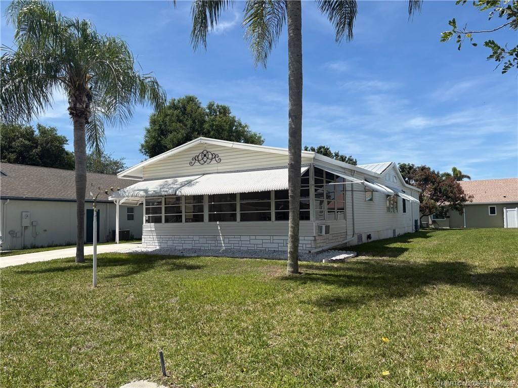 Photo of 2465 SW Versailles Terrace, Stuart, FL 34997 (MLS # M20055567)