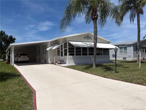 Photo of 2465 SW Versailles Terrace, Stuart, FL 34997 (MLS # M20055567)