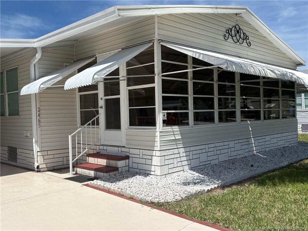Photo of 2465 SW Versailles Terrace, Stuart, FL 34997 (MLS # M20055567)