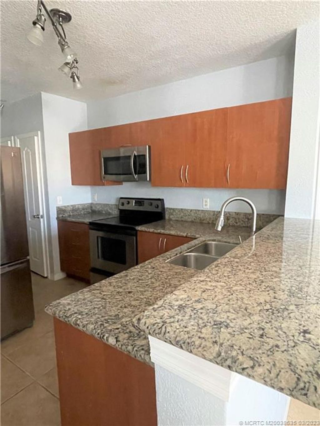 Photo of 140 SW Peacock Boulevard #21-203, Port Saint Lucie, FL 34986 (MLS # M20038635)