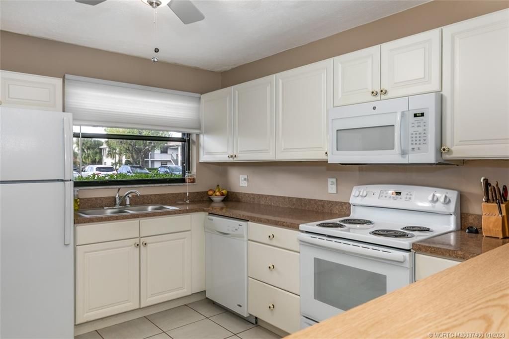 Photo of 1290 SE Parkview Place #A3, Stuart, FL 34994 (MLS # M20037400)