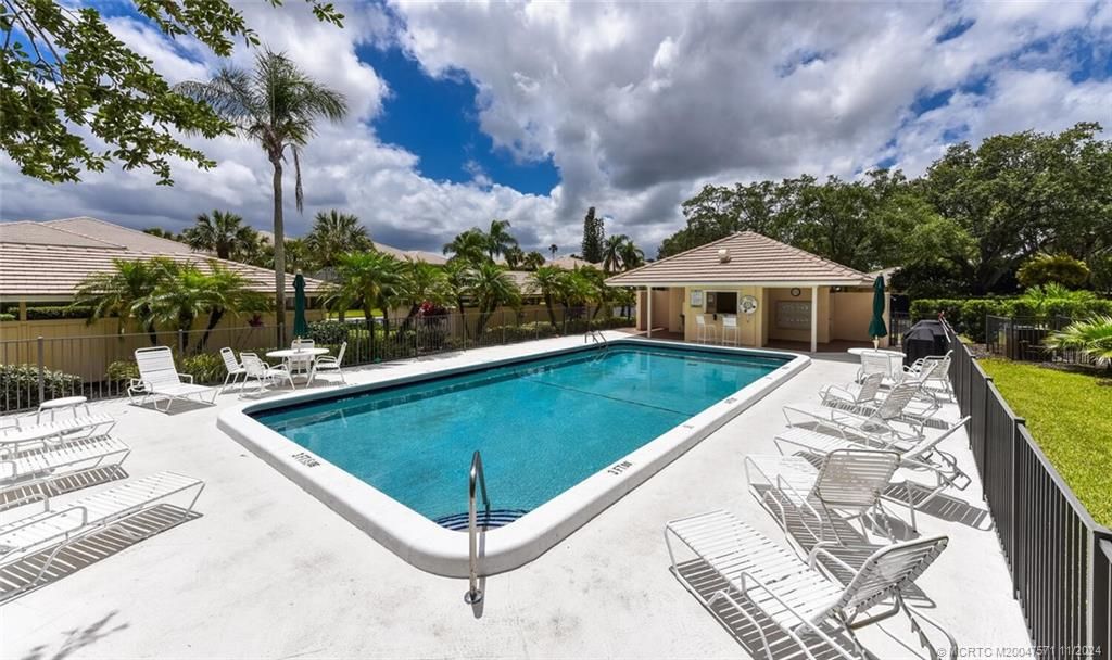 Photo of 4061 SW Parkgate Boulevard #H, Palm City, FL 34990 (MLS # M20047571)