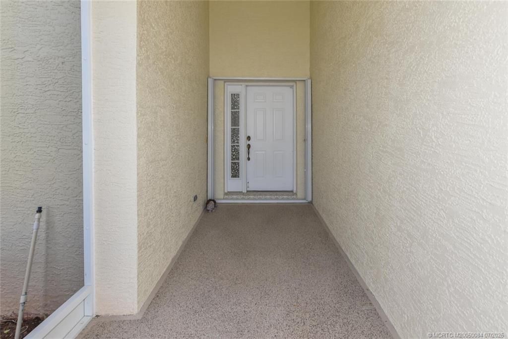 Photo of 851 NW Sorrento Lane, Port Saint Lucie, FL 34986 (MLS # M20050084)