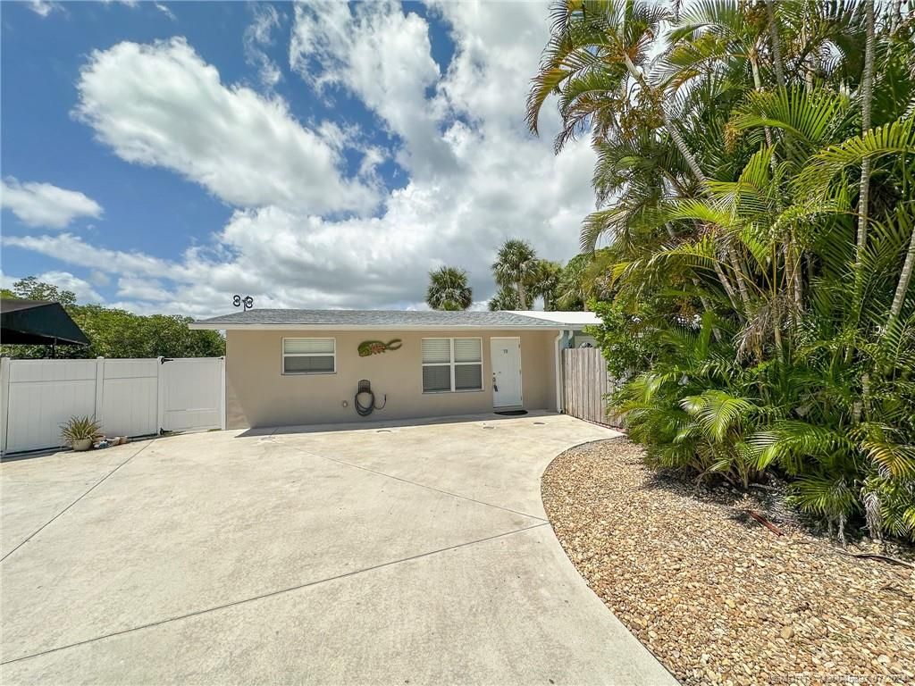 Photo of 70 SW Hideaway Place, Stuart, FL 34994 (MLS # M20045697)