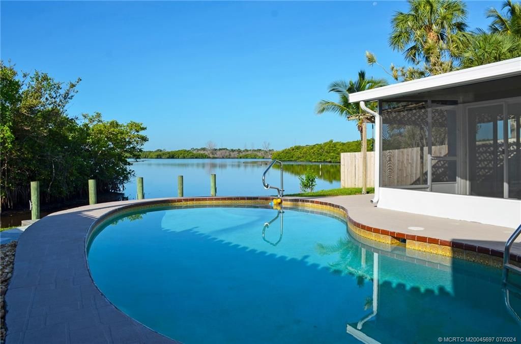 Photo of 70 SW Hideaway Place, Stuart, FL 34994 (MLS # M20045697)