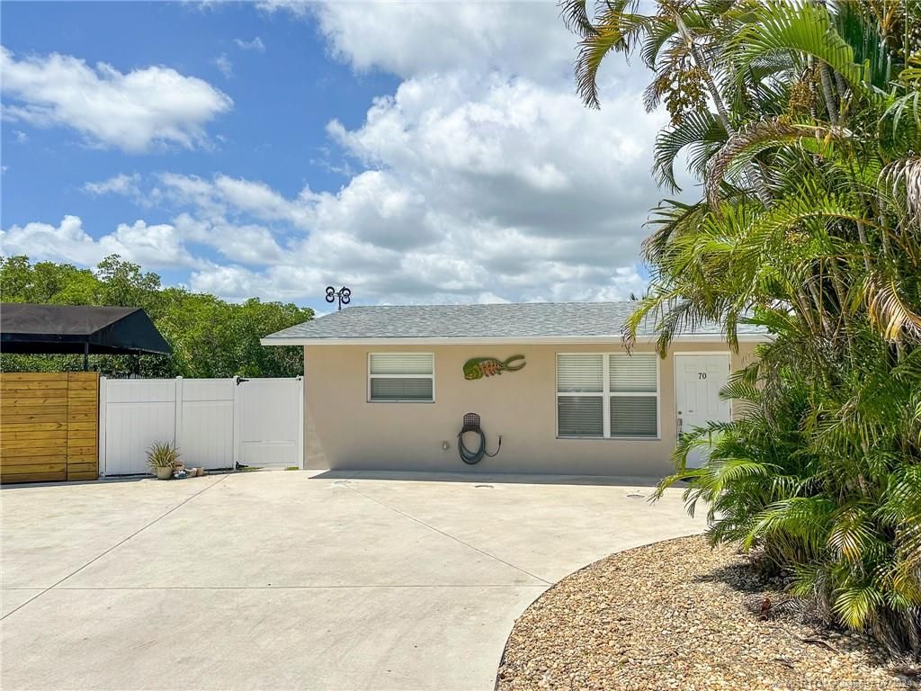 Photo of 70 SW Hideaway Place, Stuart, FL 34994 (MLS # M20045697)