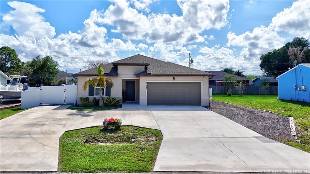 Photo of 2068 SW McAllister Lane Lane, Port Saint Lucie, FL 34953 (MLS # M20055671)