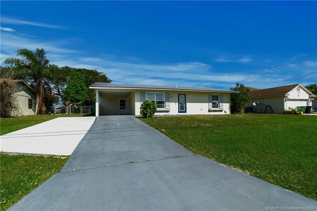 Photo of 1365 SW Gastador Avenue, Port Saint Lucie, FL 34953 (MLS # M20054448)