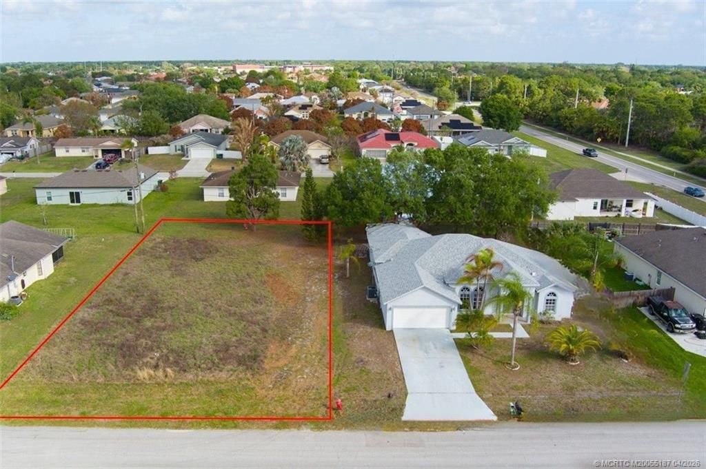 Photo of 417 SW Prater Avenue, Port Saint Lucie, FL 34953 (MLS # M20055187)