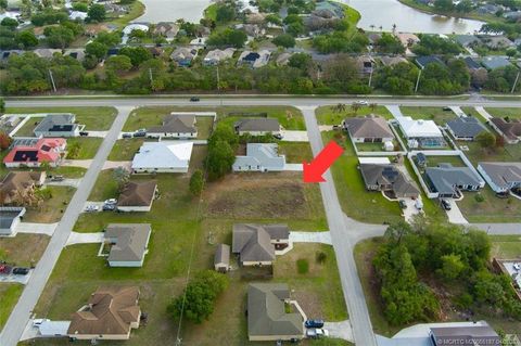 Photo of 417 SW Prater Avenue, Port Saint Lucie, FL 34953 (MLS # M20055187)