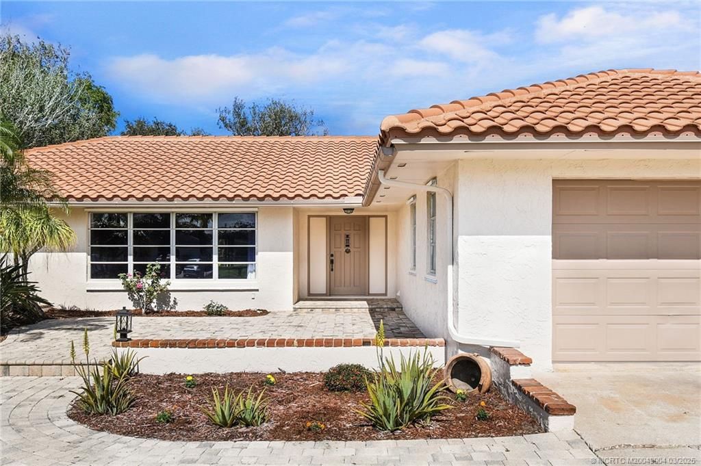 Photo of 2457 NW Everglades Boulevard, Stuart, FL 34994 (MLS # M20049004)