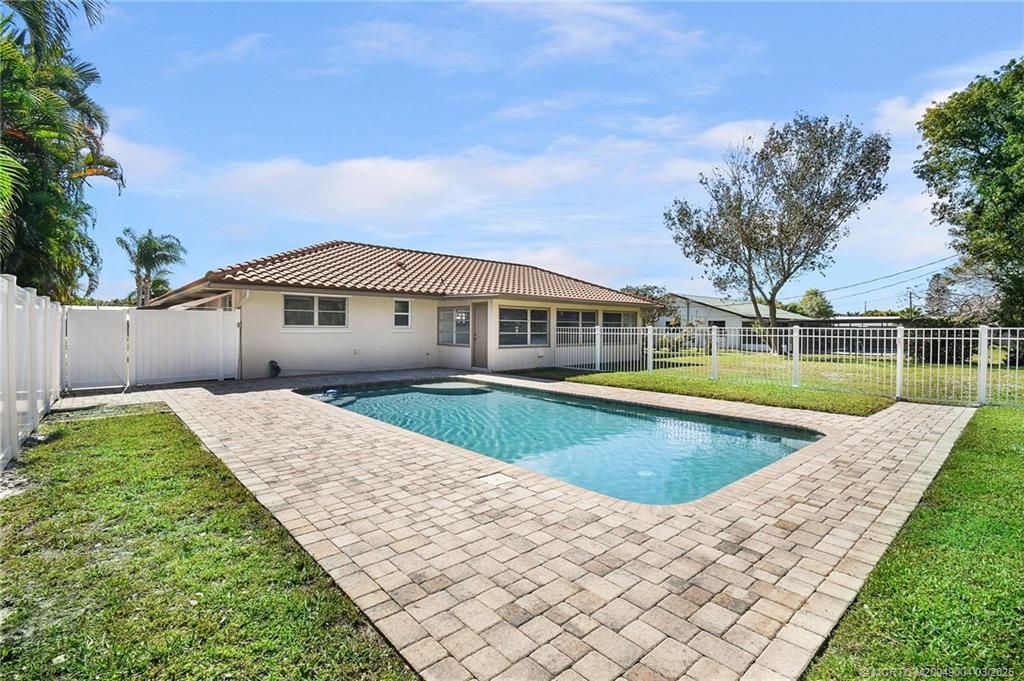 Photo of 2457 NW Everglades Boulevard, Stuart, FL 34994 (MLS # M20049004)