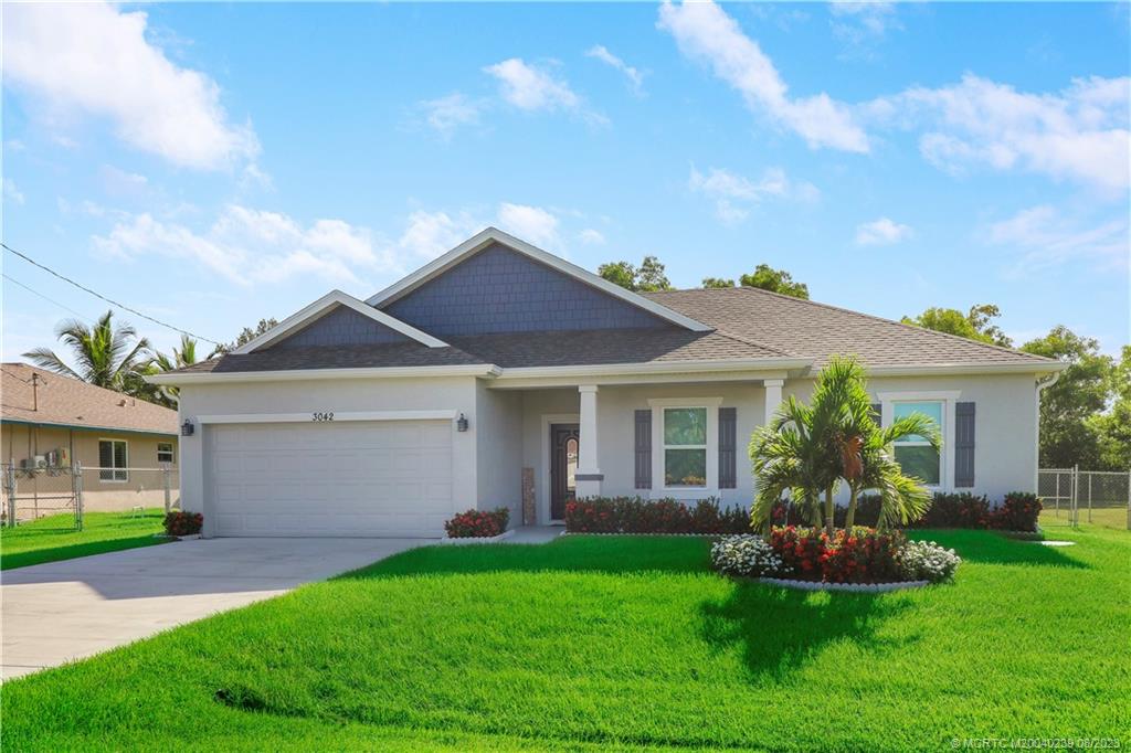 Photo of 3042 SE East Blackwell Drive, Port Saint Lucie, FL 34952 (MLS # M20040239)