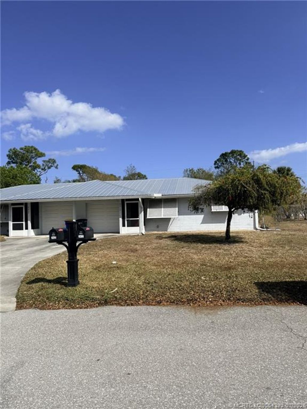 Photo of 2417 NW Holiday Court, Stuart, FL 34994 (MLS # M20054393)