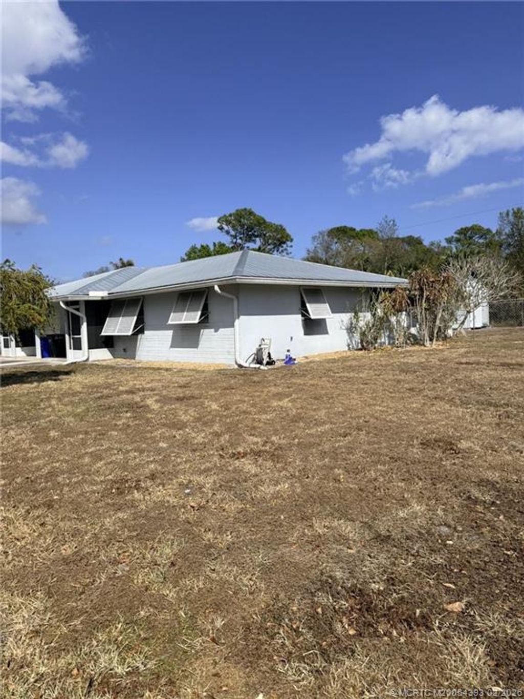 Photo of 2417 NW Holiday Court, Stuart, FL 34994 (MLS # M20054393)