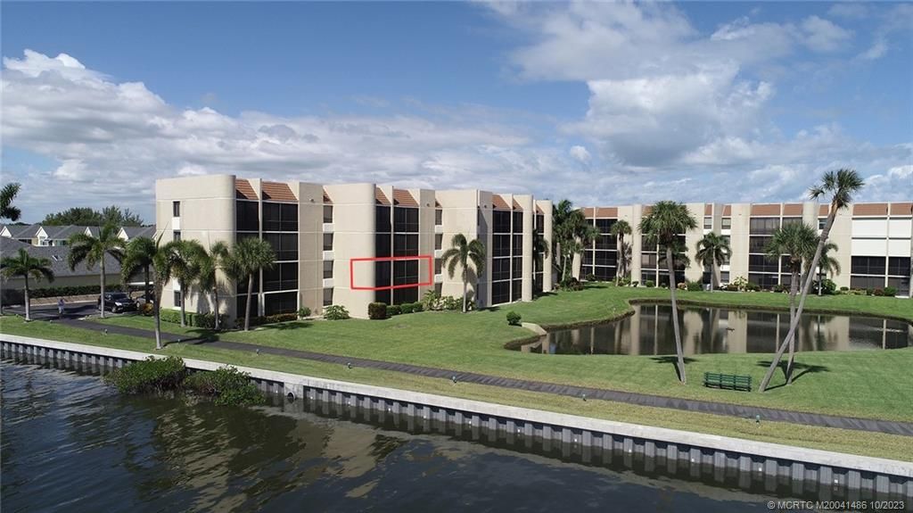 Photo of 3382 NE Causeway Boulevard #203, Jensen Beach, FL 34957 (MLS # M20041486)