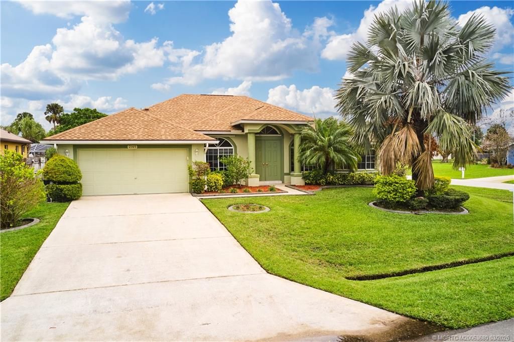 Photo of 2165 SW Drexel Street, Port Saint Lucie, FL 34953 (MLS # M20053680)