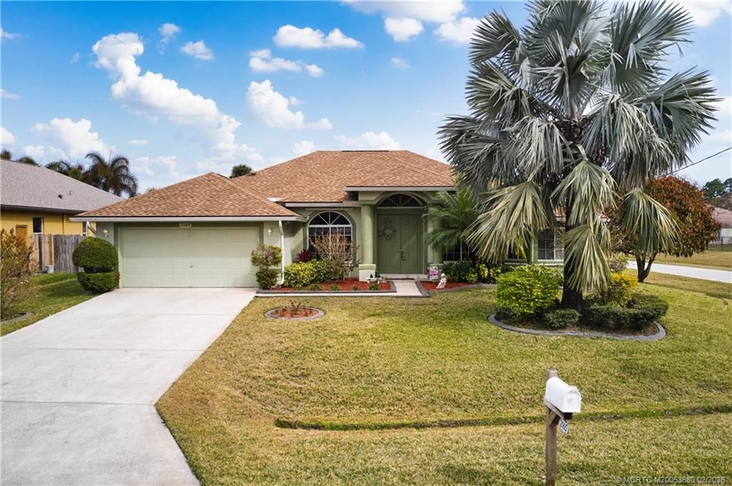 Photo of 2165 SW Drexel Street, Port Saint Lucie, FL 34953 (MLS # M20053680)