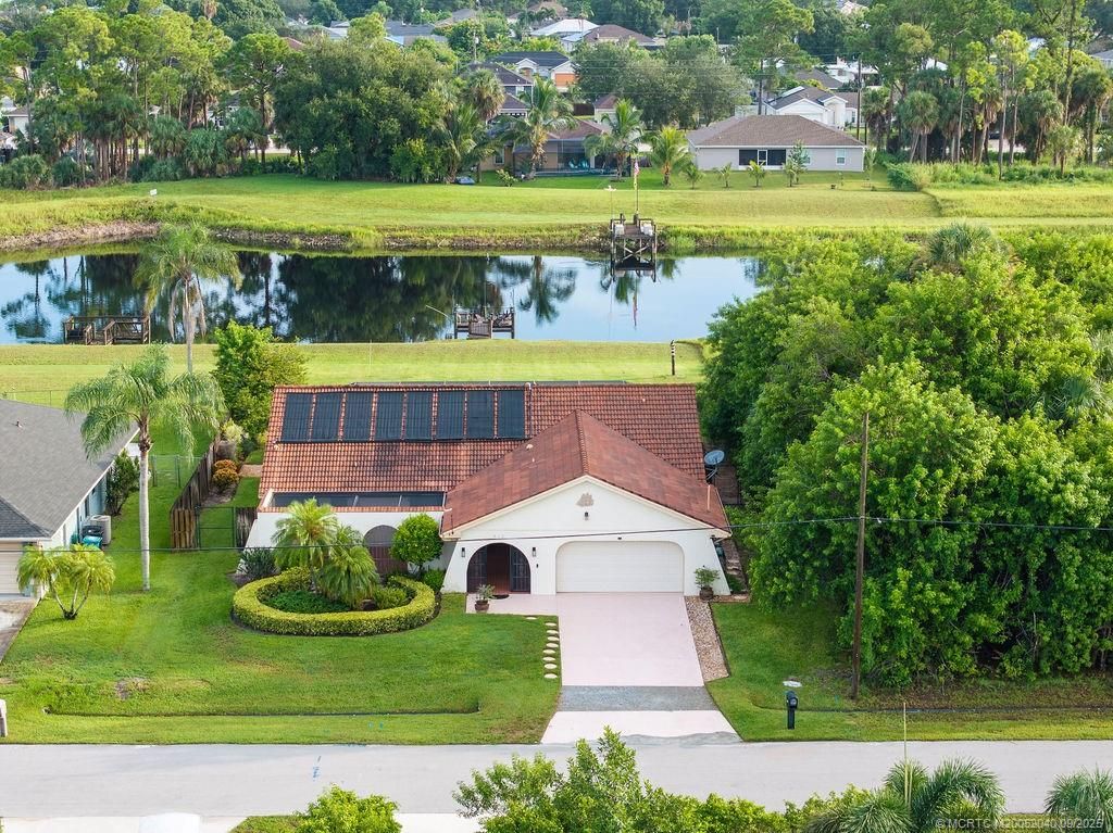 Photo of 917 SW Abingdon Avenue, Port Saint Lucie, FL 34953 (MLS # M20052040)