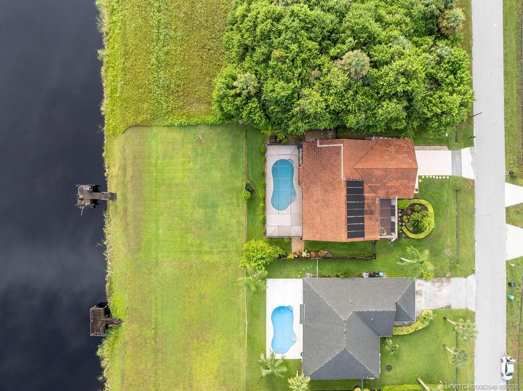 Photo of 917 SW Abingdon Avenue, Port Saint Lucie, FL 34953 (MLS # M20052040)