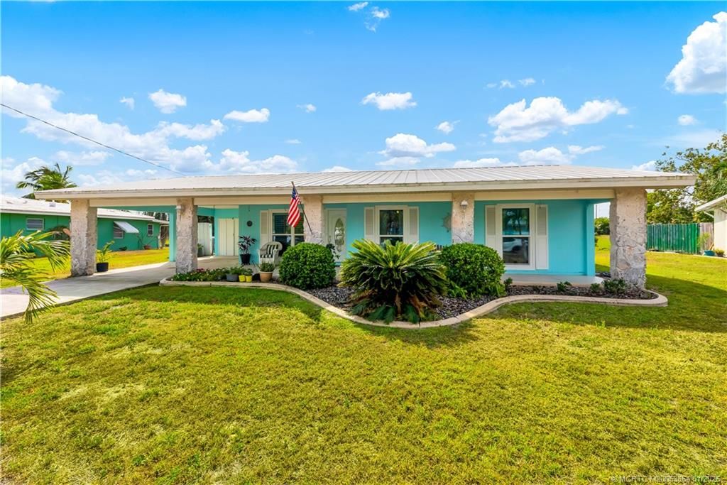 Photo of 649 SE Calmoso Drive, Port Saint Lucie, FL 34983 (MLS # M20053864)