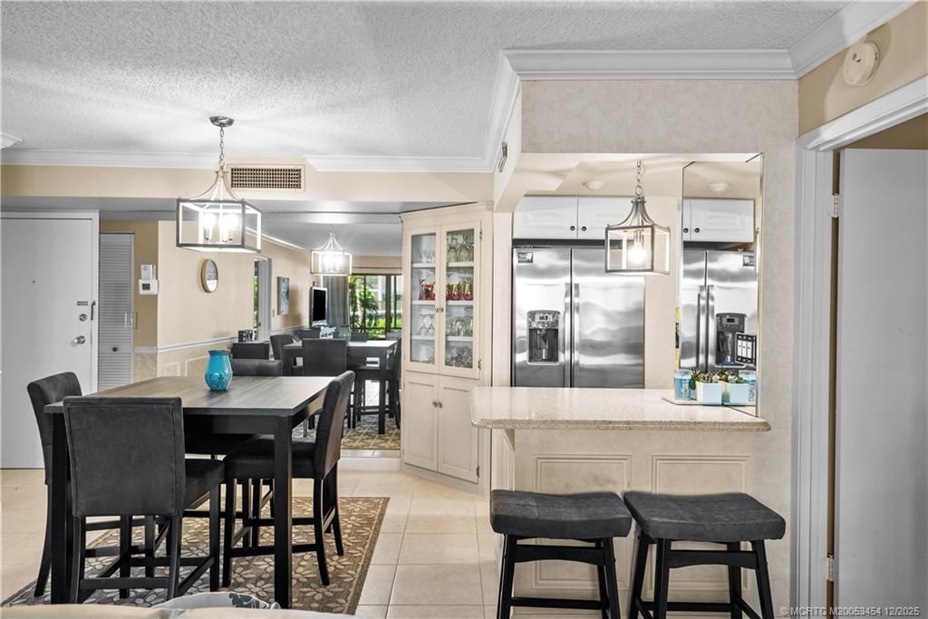 Photo of 3792 NE Ocean Boulevard #120N, Jensen Beach, FL 34957 (MLS # M20053454)