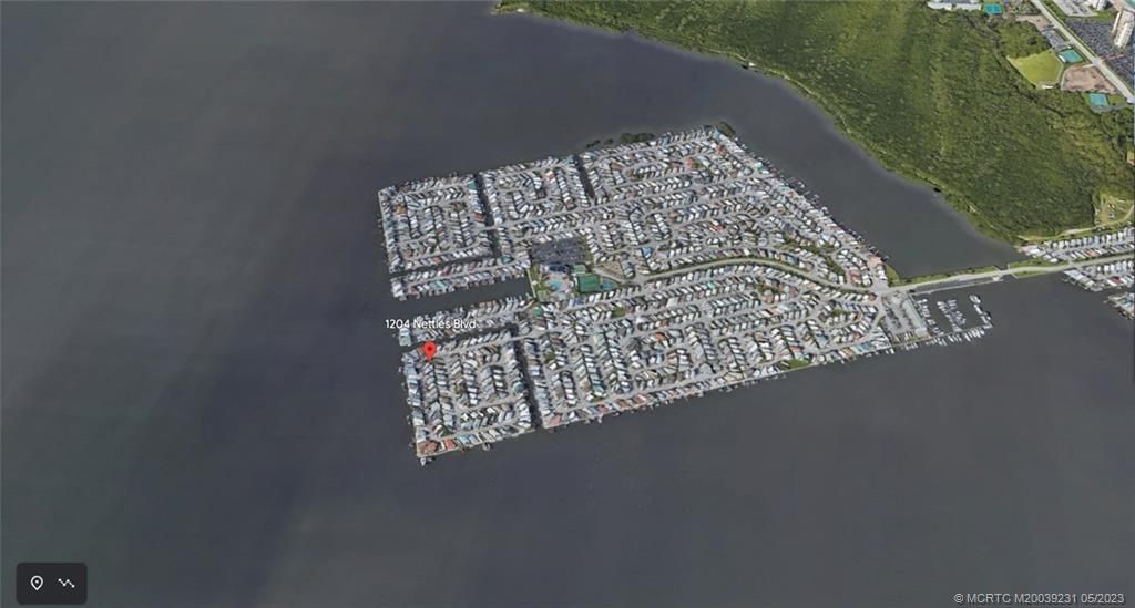 Photo of 1204 Nettles Boulevard, Jensen Beach, FL 34957 (MLS # M20039231)