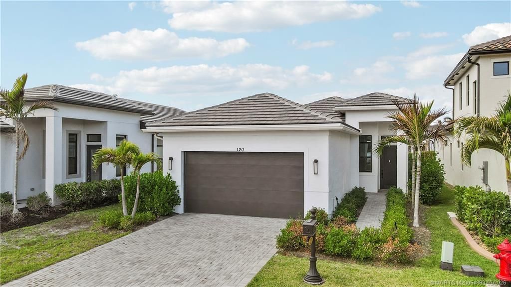 Photo of 120 SE Cortile Enza, Port Saint Lucie, FL 34952 (MLS # M20054863)