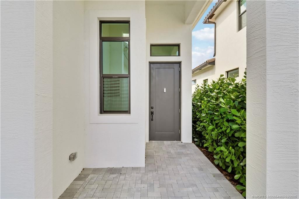 Photo of 120 SE Cortile Enza, Port Saint Lucie, FL 34952 (MLS # M20054863)