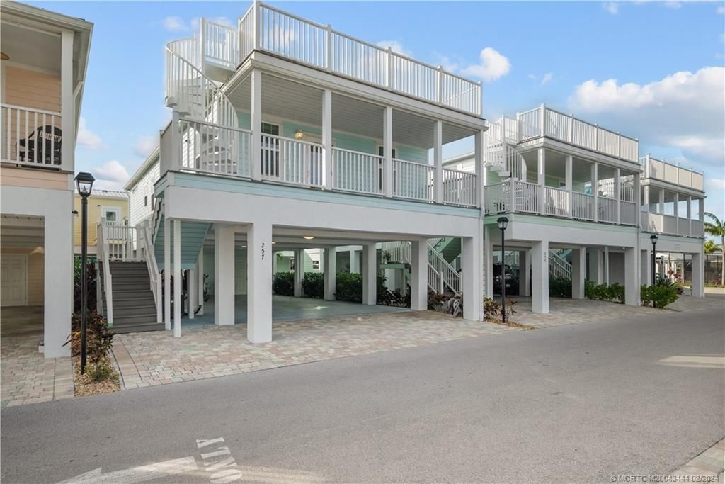 Photo of 257 NE Coastal Drive, Jensen Beach, FL 34957 (MLS # M20043444)