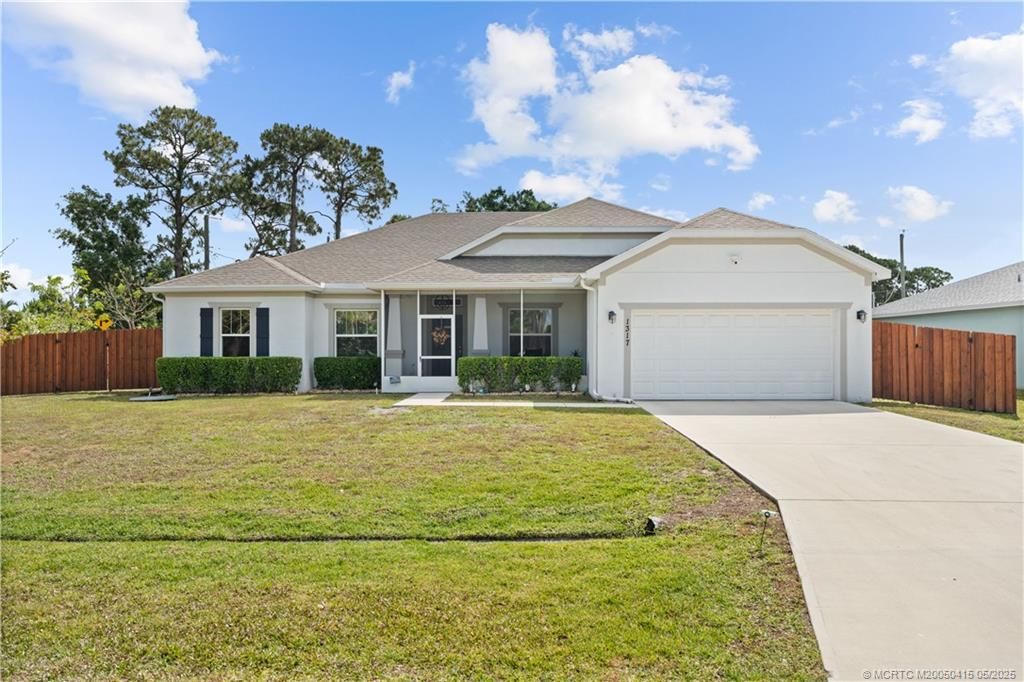 Photo of 1317 SE Odonnell Lane, Port Saint Lucie, FL 34983 (MLS # M20050415)