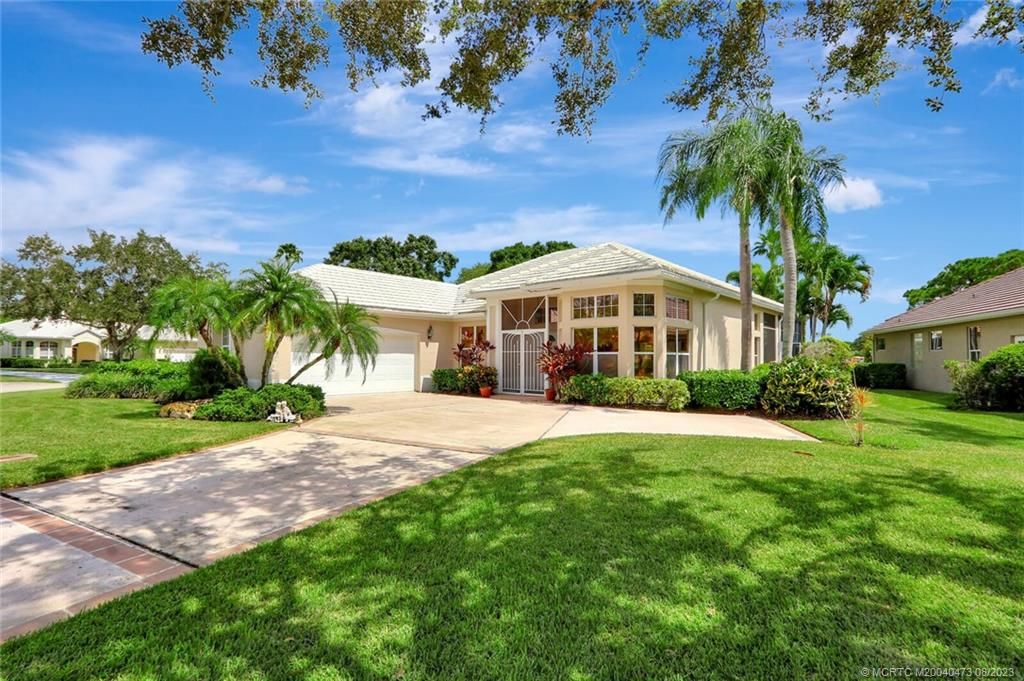 Photo of 1699 SW Monarch Club Drive, Palm City, FL 34990 (MLS # M20040473)