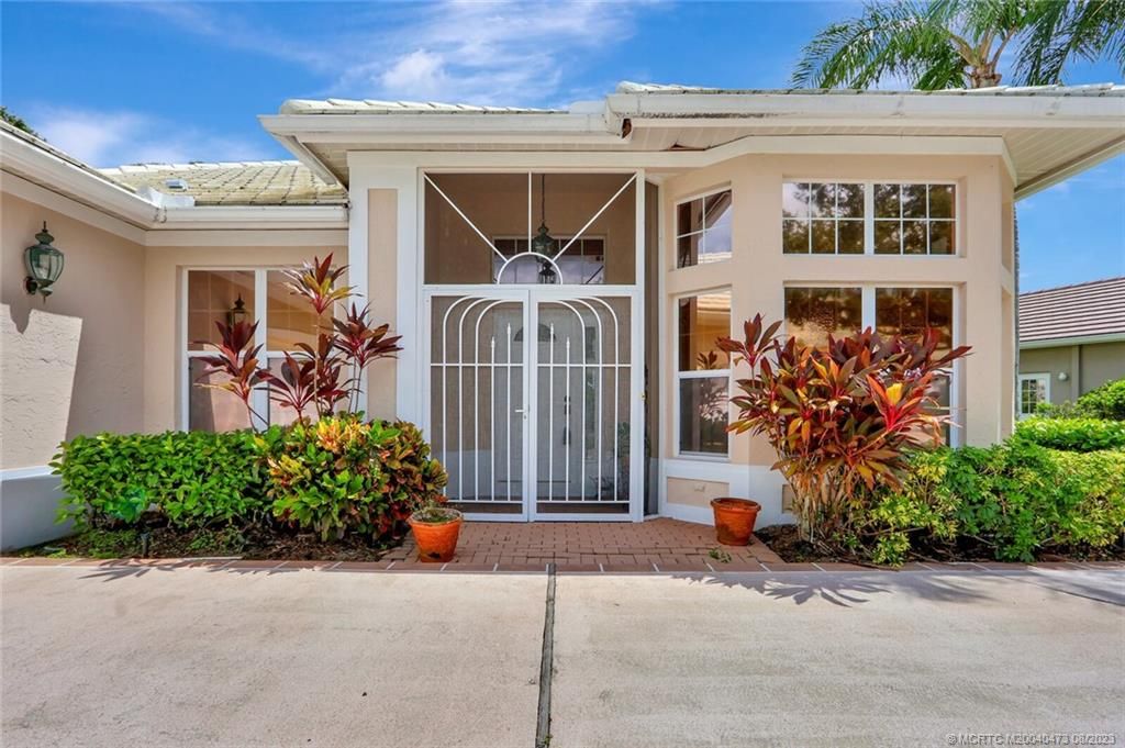Photo of 1699 SW Monarch Club Drive, Palm City, FL 34990 (MLS # M20040473)