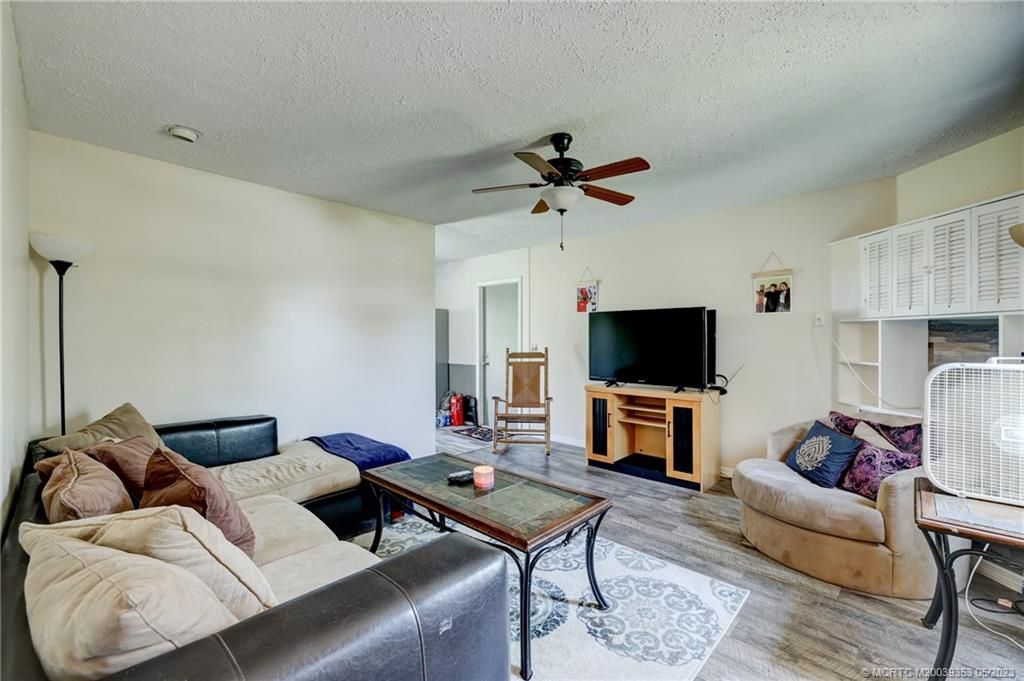 Photo of 461 SE Evans Avenue, Port Saint Lucie, FL 34984 (MLS # M20039353)