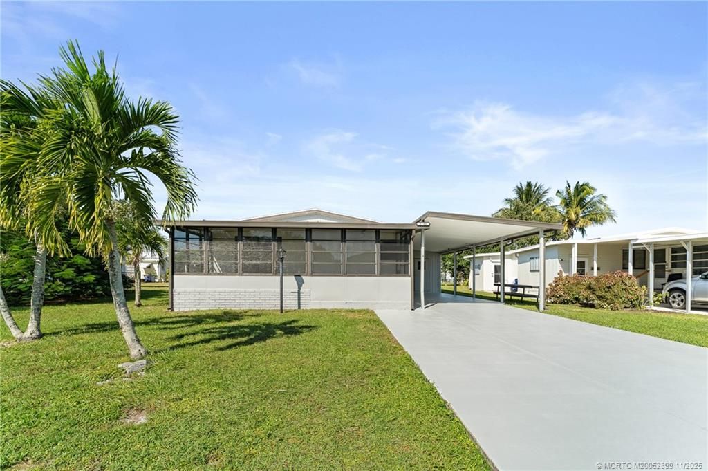 Photo of 2733 SW Thunderbird Trail, Stuart, FL 34997 (MLS # M20052899)