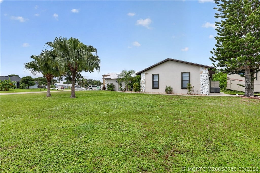 Photo of 272 SW Ewing Avenue, Port Saint Lucie, FL 34983 (MLS # M20056758)