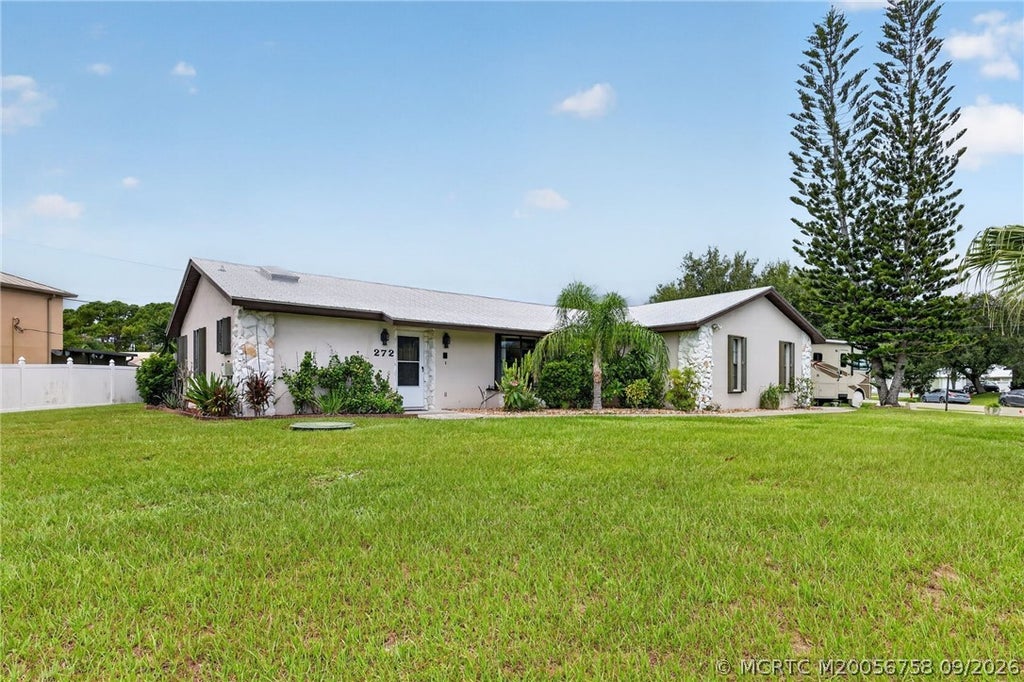 Photo of 272 SW Ewing Avenue, Port Saint Lucie, FL 34983 (MLS # M20056758)
