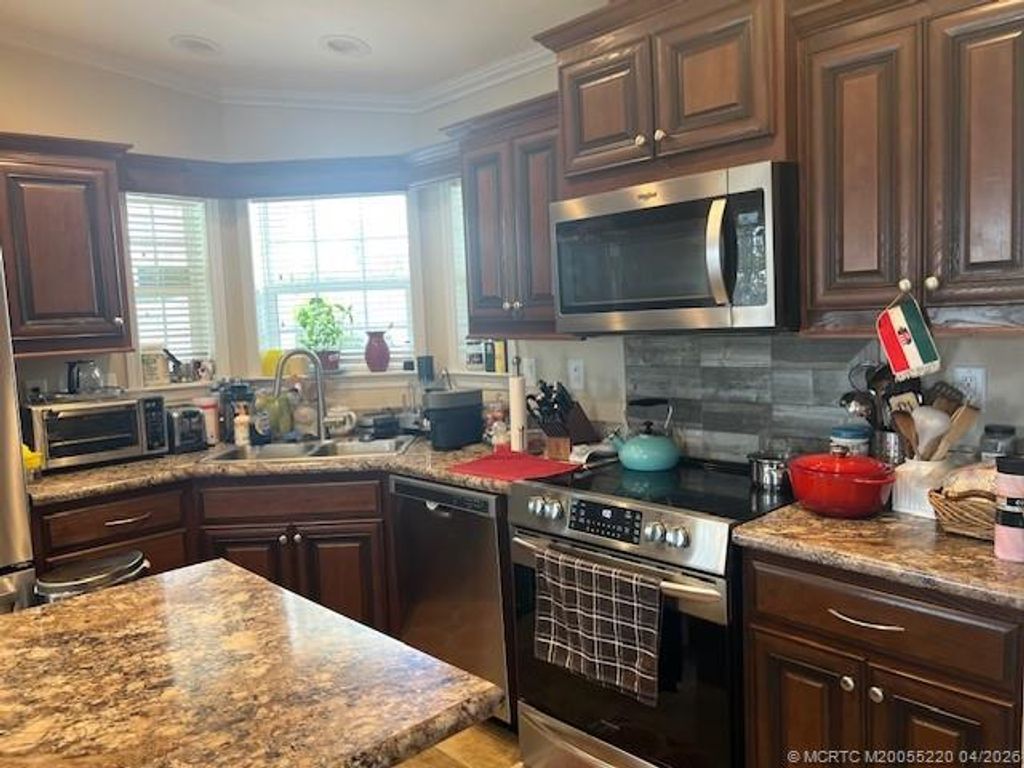 Photo of 4241 Royal Manor Boulevard, Boynton Beach, FL 33436 (MLS # M20055220)