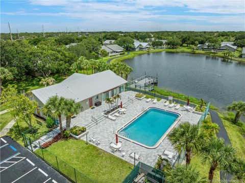 Photo of 4060 NW Cinnamon Tree Circle, Jensen Beach, FL 34957 (MLS # M20055940)