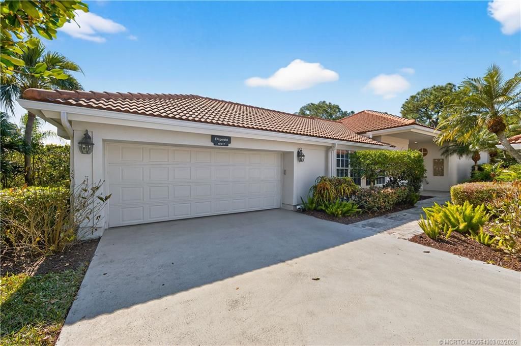 Photo of 13017 Harbour Ridge Boulevard, Palm City, FL 34990 (MLS # M20054303)