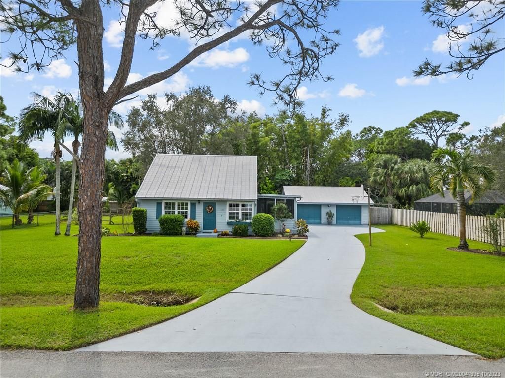 Photo of 1082 SW Pine Tree Lane, Palm City, FL 34990 (MLS # M20041395)