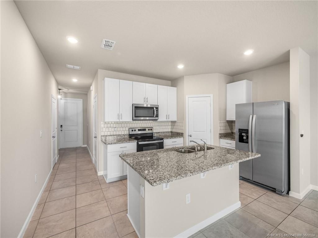 Photo of 327 SE Halifax Lane, Stuart, FL 34994 (MLS # M20045388)