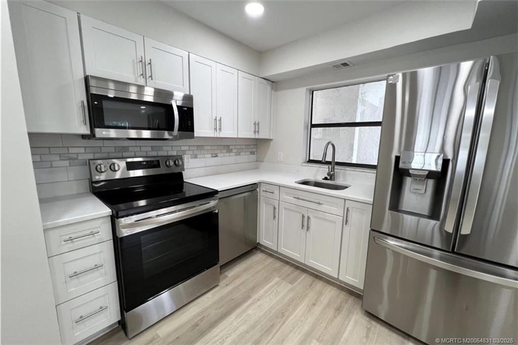 Photo of 1950 SW Palm City Road #4-201, Stuart, FL 34994 (MLS # M20054831)