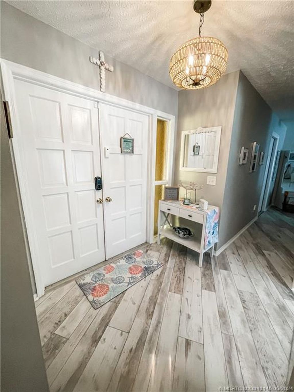 Photo of 434 NE Acacia Place, Jensen Beach, FL 34957 (MLS # M20040145)