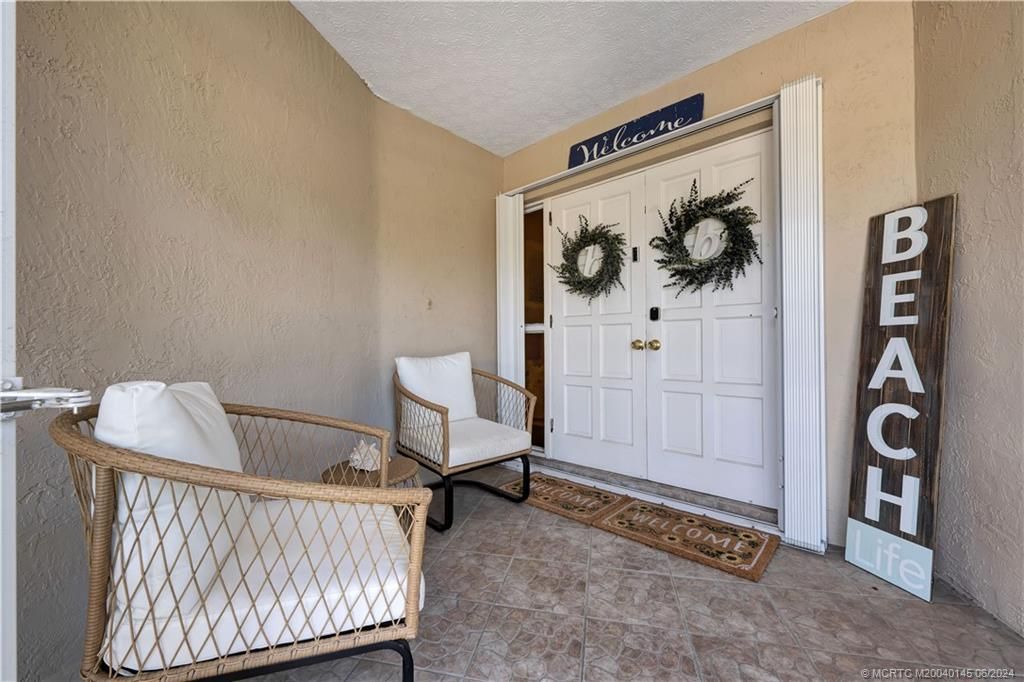 Photo of 434 NE Acacia Place, Jensen Beach, FL 34957 (MLS # M20040145)