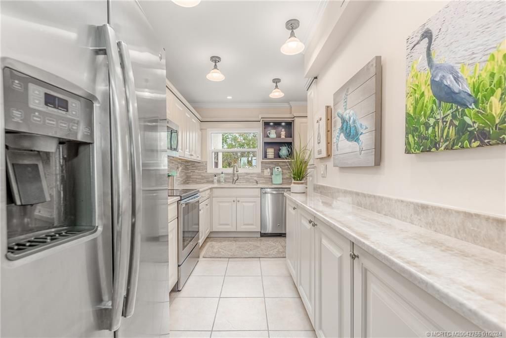 Photo of 3901 SE St Lucie Boulevard #F-46, Stuart, FL 34997 (MLS # M20042755)