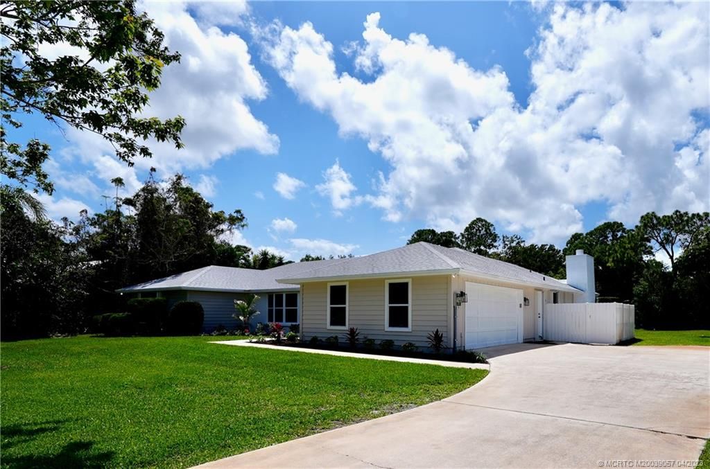 Photo of 440 NE Town Terrace, Jensen Beach, FL 34957 (MLS # M20039057)
