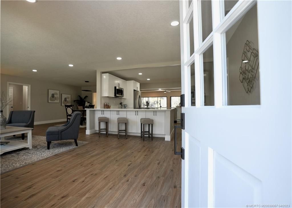 Photo of 440 NE Town Terrace, Jensen Beach, FL 34957 (MLS # M20039057)