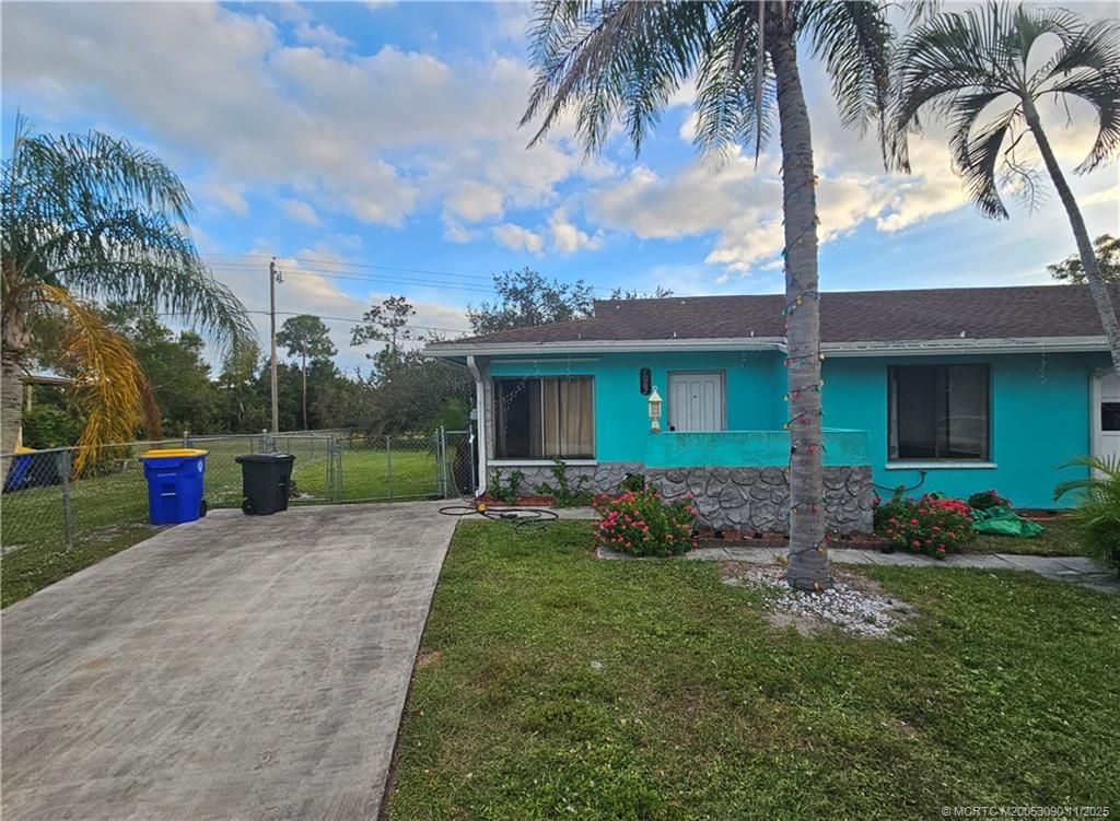 Photo of 1082 N Saint Lawrence Way, Stuart, FL 34997 (MLS # M20053090)